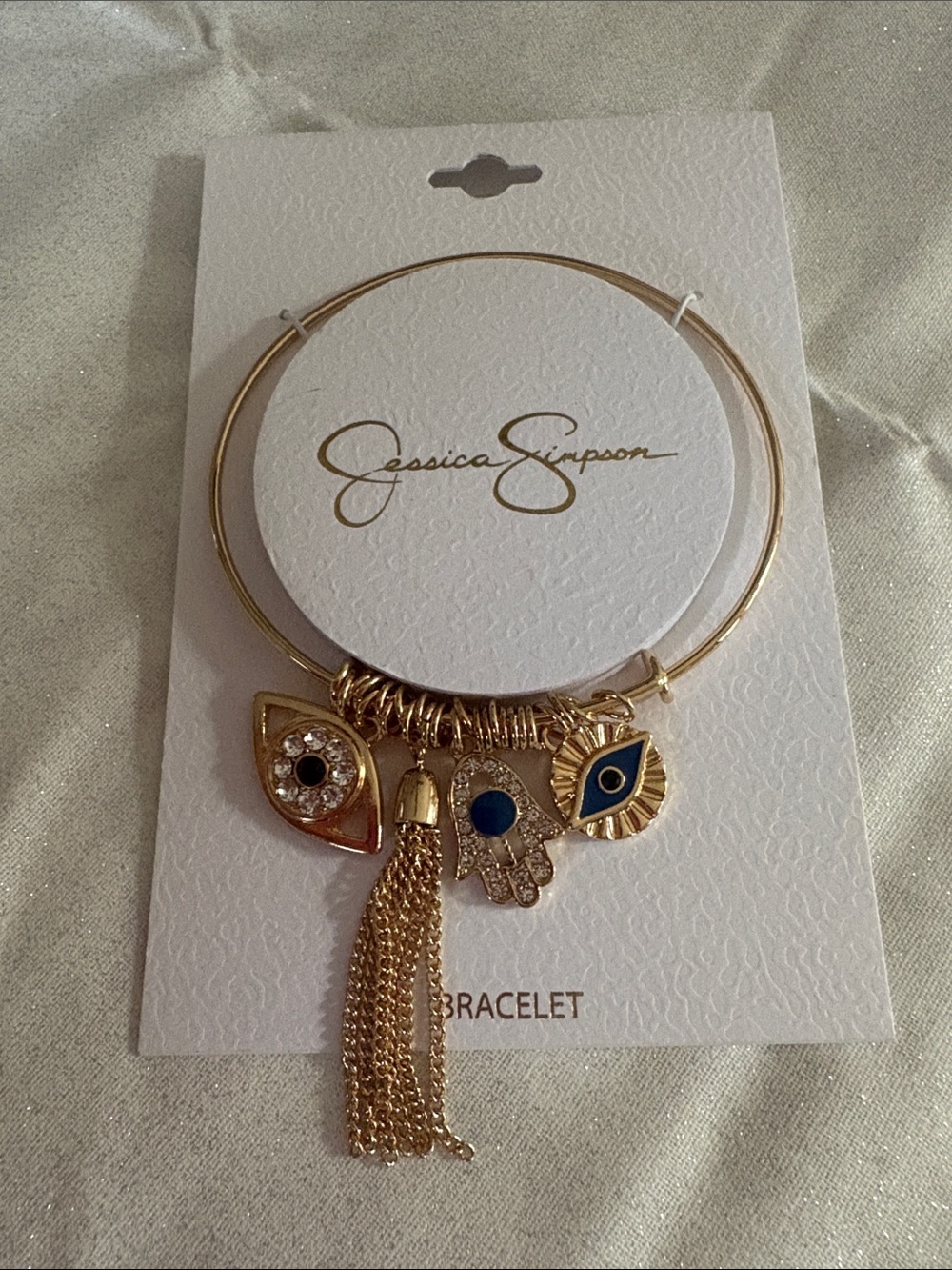Jessica Simpson Gold Charm Bangle with Blue and Black Enamel Accents